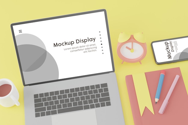 画面配置モックアップ付きの携帯電話とラップトップ