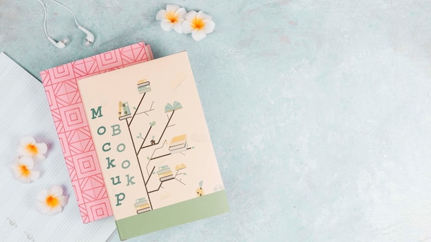 mock-up book cover and flowers on copy space background