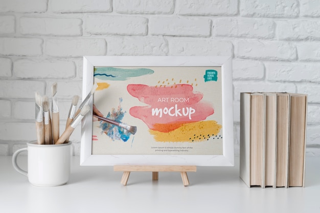 PSD mock up frame beside books