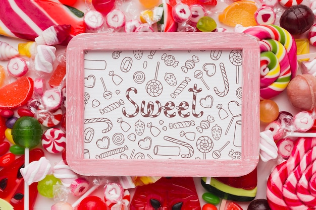 Mock-up frame with candies beside