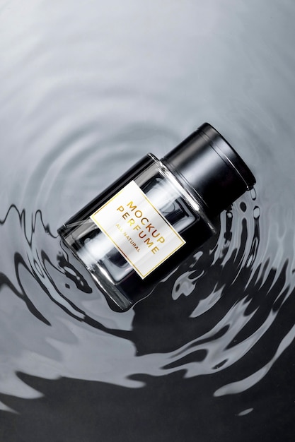 mock-up of glass bottle of perfume with clear water
