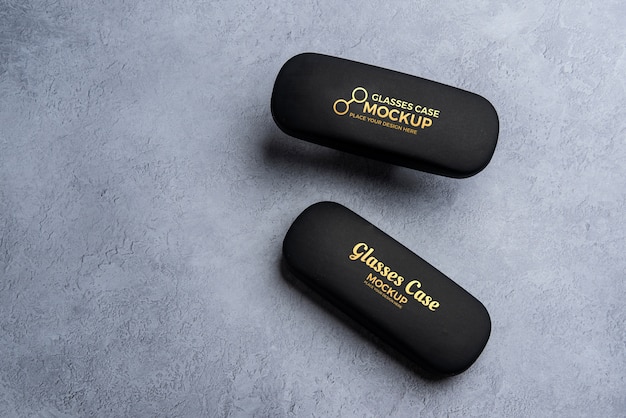 PSD mock-up of glasses cases with engraved text effect