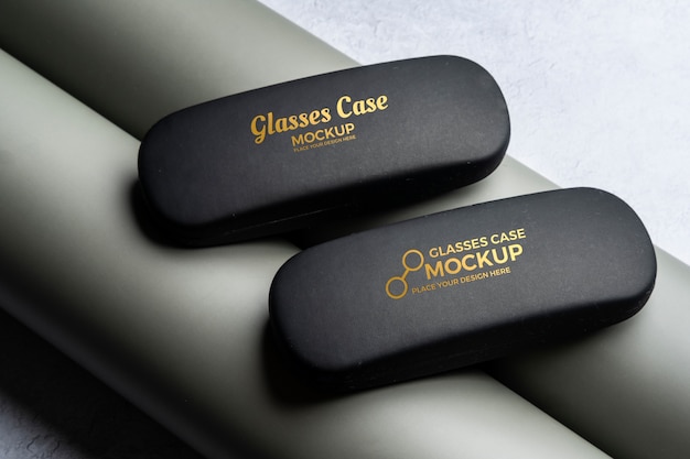 PSD mock-up of glasses cases with engraved text effect