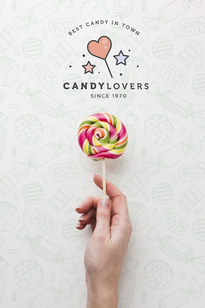 Mock-up hand with lollipop