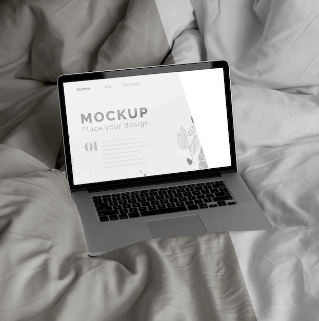 PSD mock up laptop in bedroom