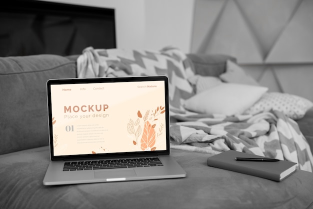 PSD mock up laptop in bedroom