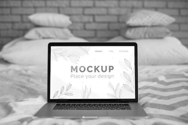 PSD mock up laptop in bedroom