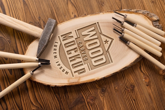 PSD mock-up logo with engraved effect on wood and tools
