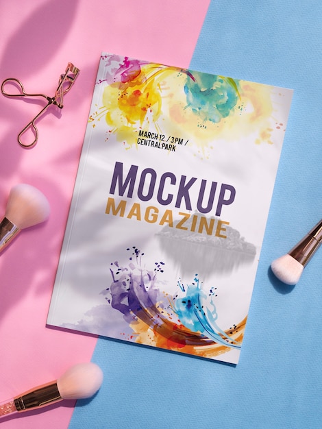 PSD mock up magazine next to makeup brushes