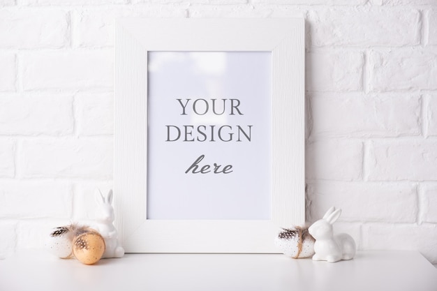 Mock up Photo frame near a white brick wall with Easter decor.