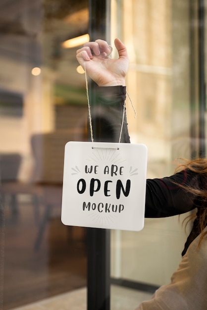 PSD mock-up sign hanging on the door