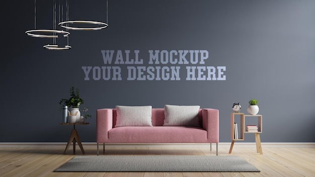 Mock up wall in modern interior has a pink sofa on empty dark wall