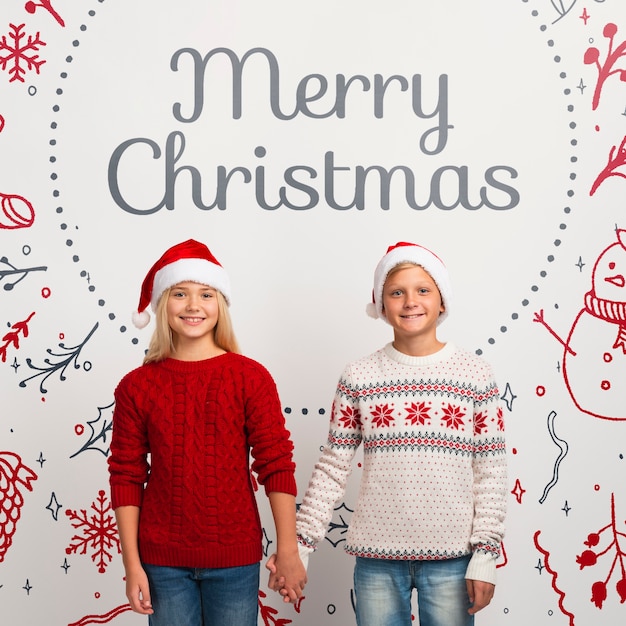 Mock-up young siblings with christmas sweaters