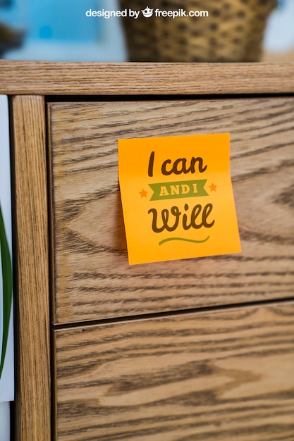 Mockup of adhesive note on wood