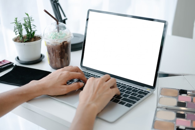 Mockup of beautiful woman shopping online with laptop on online websites