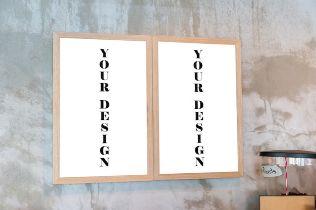 Mockup of Blank photo frames on the wall