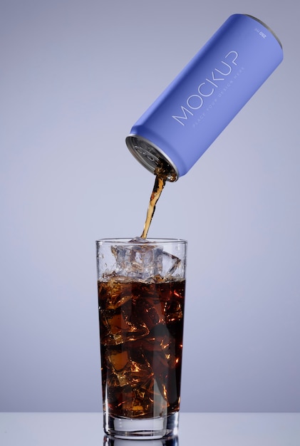 PSD mockup of drink can pouring liquid