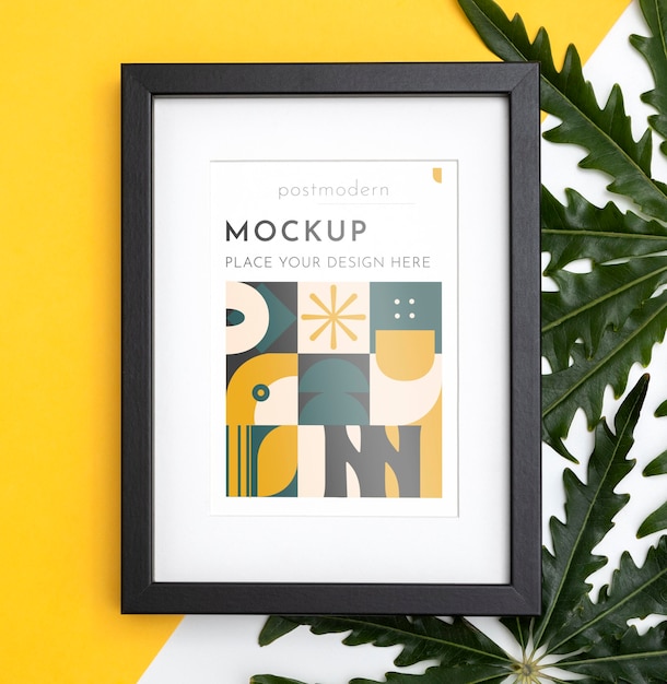 PSD mockup frame on wall with leaves