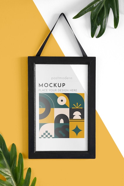 Mockup frame on wall with leaves