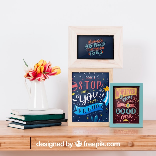 PSD mockup of frames next to books