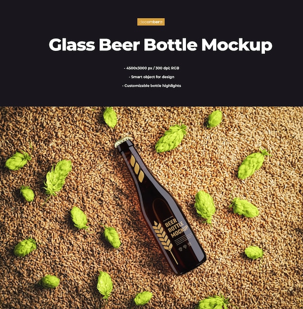 Mockup of a glass beer bottle lying on hops and wheat