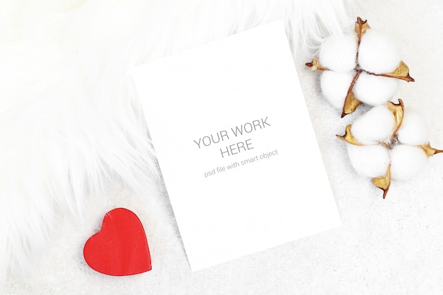 Mockup greeting card with cotton on furry background