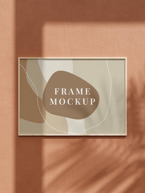 Mockup horizontal wooden photo frame brown wall mounted with shadow on summer