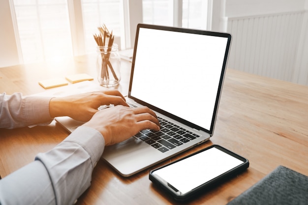 Mockup image of close up business woman working with smartphone laptop and documents in office, mockup concept