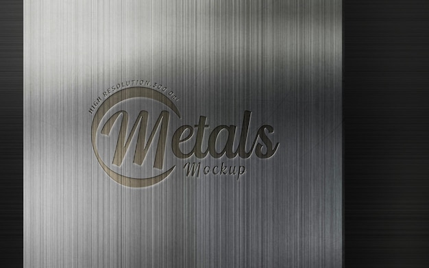 Mockup logo wygrawerowanego na teksturze metalowej