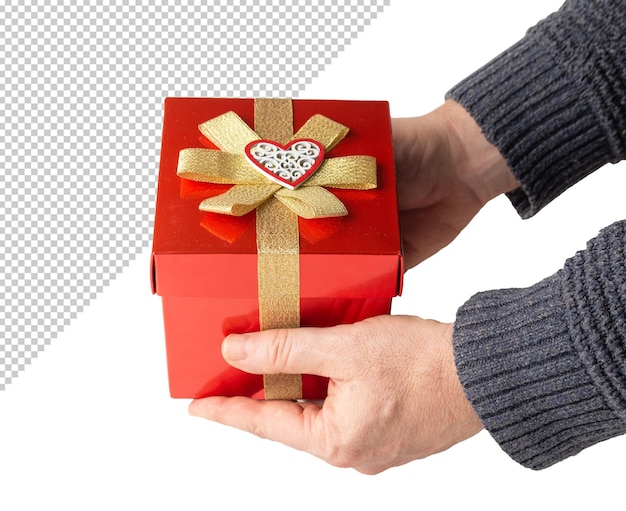 PSD mockup delle mani di un uomo che tiene una confezione regalo rossa con nastro d'oro