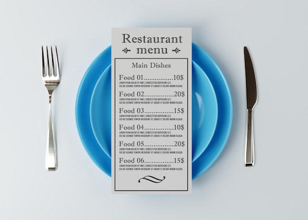 Mockup of menu lies above a plate with a knife and fork