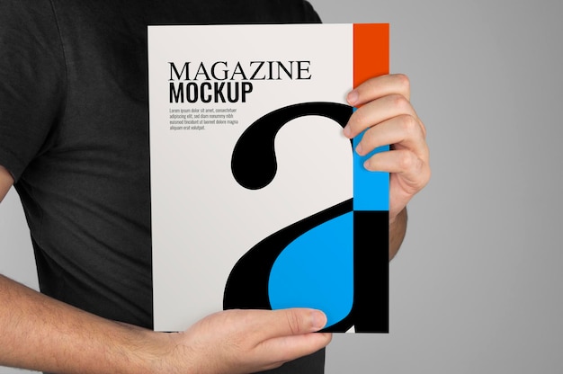 Mockup of model holding a magazine