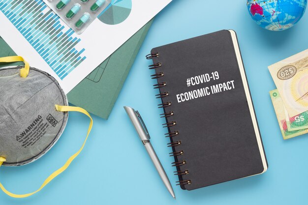 Mockup Notebook voor Covid 19 Economische impact