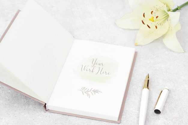 PSD mockup notes with lily and white pen