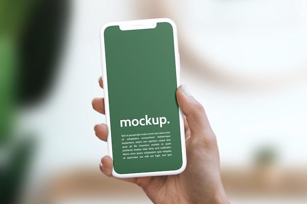 PSD mockup of phone screen in hand