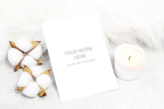 Mockup postcard with candle and cotton