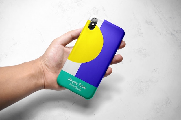 PSD mockup of a smartphone case in hand