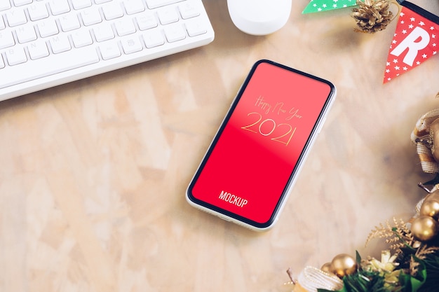 Mockup-smartphone voor Kerstmis en Nieuwjaar