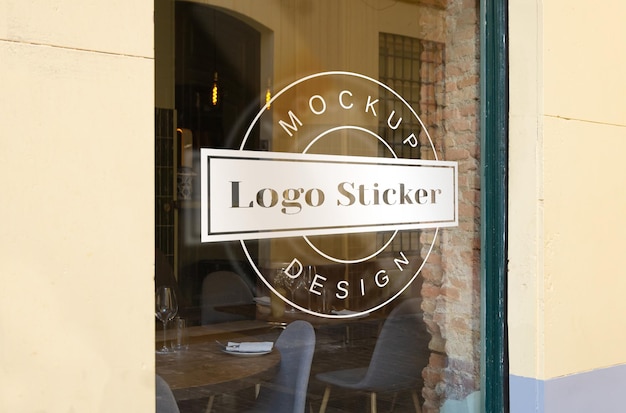 PSD mockup of a sticker logo on a shop window