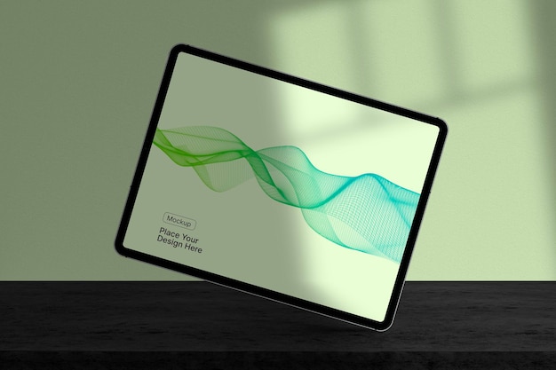 Mockup tabletu z abstrakcyjnym kształtem fali na ekranie