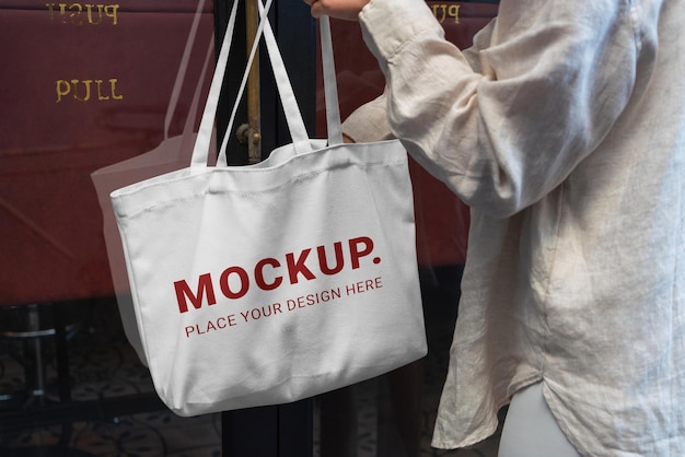 PSD mockup tote bag eco model holding