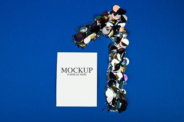 PSD mockup of unit with confetti and sheet of paper