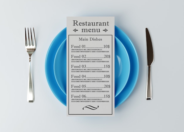 Mockup van menu ligt boven een bord met een mes en vork