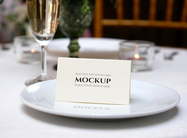 PSD mockup white blank card on wedding table setting