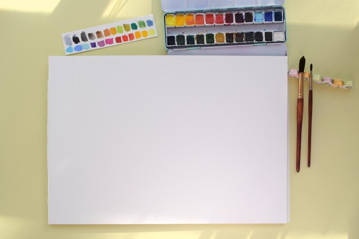 PSD mockup white paper blank watercolour painting with brushes and paints