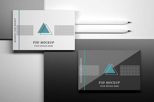 Mockup with top view of business cards and pencils