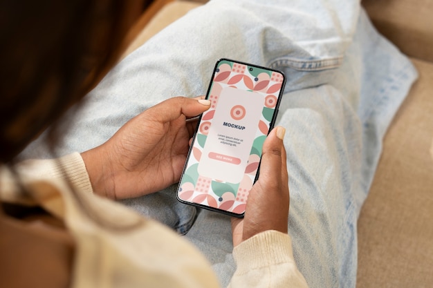 Model  holding smartphone mockup