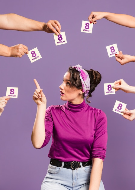 model pointing at sticky notes