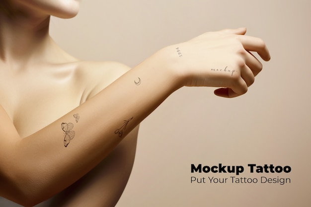 PSD model posing with arm tattoo  mockup