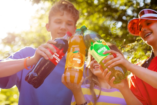 Models posing with bottle mockup